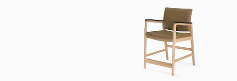 A Monarch Easy Access Chair in tan fabric with solid hardwood frame and urethane arm caps. A Monarch Easy Access Chair in tan fabric with solid hardwood frame and urethane arm caps.
