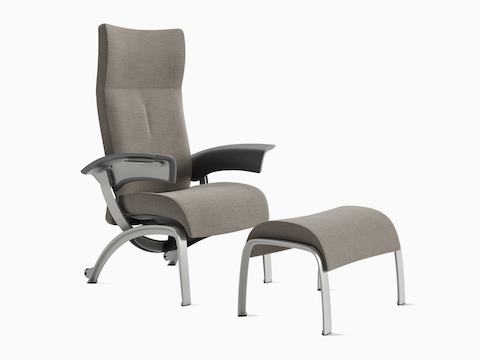 Nala Patient Chair and Ottoman in a gray upholstery with gray arms with a silver frame and legs. Nala Patient Chair and Ottoman in a gray upholstery with gray arms with a silver frame and legs.