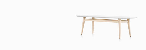Palisade Coffee Table with wood legs and white solid surface top. Palisade Coffee Table with wood legs and white solid surface top.