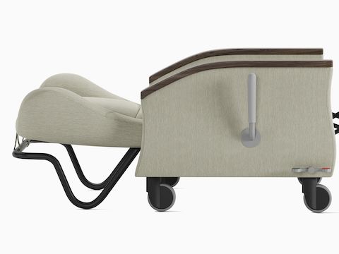 Serenity Recliner with push bar in a light gray upholstery in full recline position. Serenity Recliner with push bar in a light gray upholstery in full recline position.
