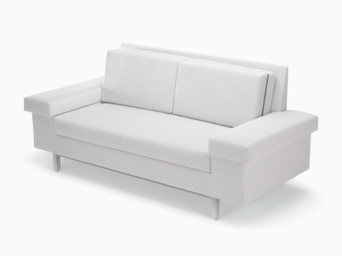 Nemschoff SleepOver Flop Sofa in white upholstery, viewed at an angle. Nemschoff SleepOver Flop Sofa in white upholstery, viewed at an angle.