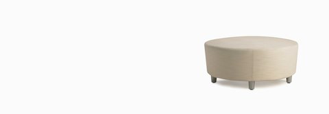 A Steps Lounge System Ottoman in a light-colored textile. A Steps Lounge System Ottoman in a light-colored textile.