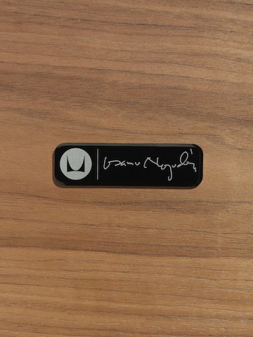 Isamu Noguchi's signature on a medallion that's affixed to every Noguchi Table as a mark of authenticity. Isamu Noguchi's signature on a medallion that's affixed to every Noguchi Table as a mark of authenticity.
