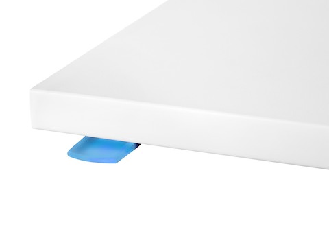 Close-up of the paddle-shaped switch used to adjust the height of Renew Sit-to-Stand Tables. Close-up of the paddle-shaped switch used to adjust the height of Renew Sit-to-Stand Tables.