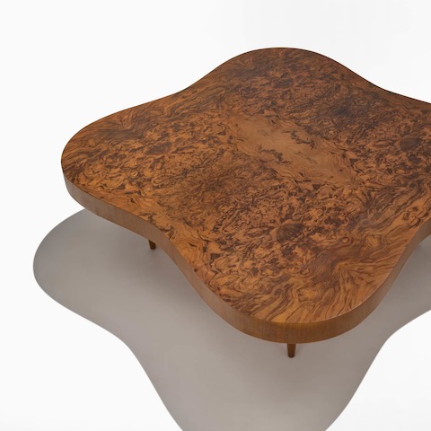 A top view of a Rohde Paldao coffee table in walnut burl. A top view of a Rohde Paldao coffee table in walnut burl.
