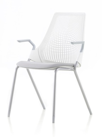 Lightweight white Sayl Side Chair with a suspension back, viewed from a 45-degree angle. Lightweight white Sayl Side Chair with a suspension back, viewed from a 45-degree angle.