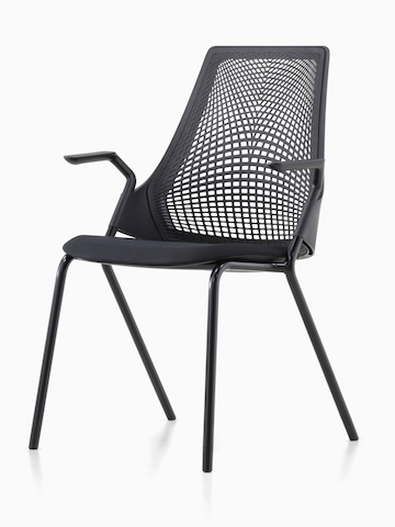 Lightweight black Sayl Side Chair with a suspension back, viewed from a 45-degree angle. Lightweight black Sayl Side Chair with a suspension back, viewed from a 45-degree angle.