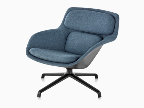 Blue low-back Striad Lounge Chair with black four-star base, viewed at an angle. Blue low-back Striad Lounge Chair with black four-star base, viewed at an angle.
