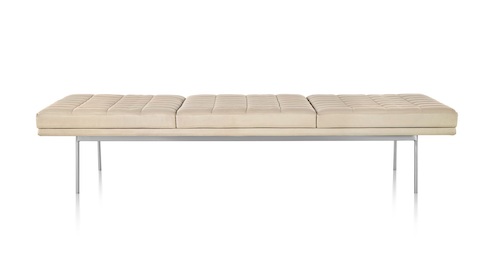 Tan Tuxedo Bench with quilted upholstery and bright chrome base, viewed from the front. Tan Tuxedo Bench with quilted upholstery and bright chrome base, viewed from the front.