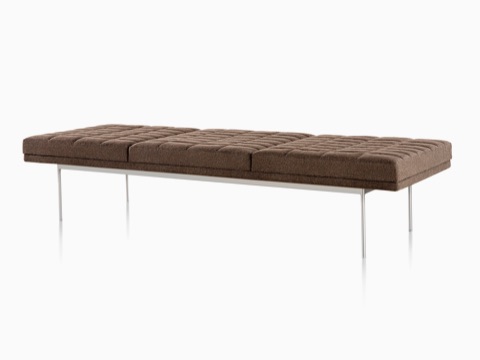 Tuxedo Bench with brown quilted upholstery and satin chrome base. Tuxedo Bench with brown quilted upholstery and satin chrome base.