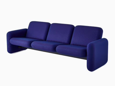 Front angle view of a Wilkes Modular Sofa Group 3 Seat Sofa in blue. Front angle view of a Wilkes Modular Sofa Group 3 Seat Sofa in blue.
