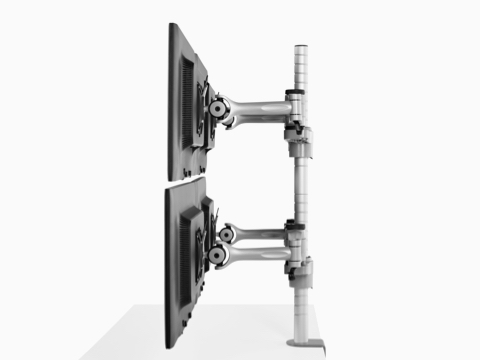 Profile view of four monitors attached to a single Wishbone Monitor Arm post. Profile view of four monitors attached to a single Wishbone Monitor Arm post.