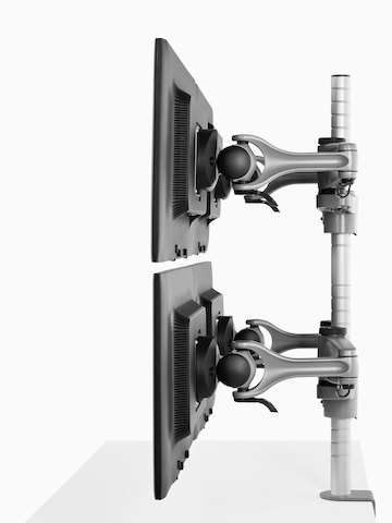 Profile view of four monitors attached to a single Wishbone Monitor Arm post. Profile view of four monitors attached to a single Wishbone Monitor Arm post.