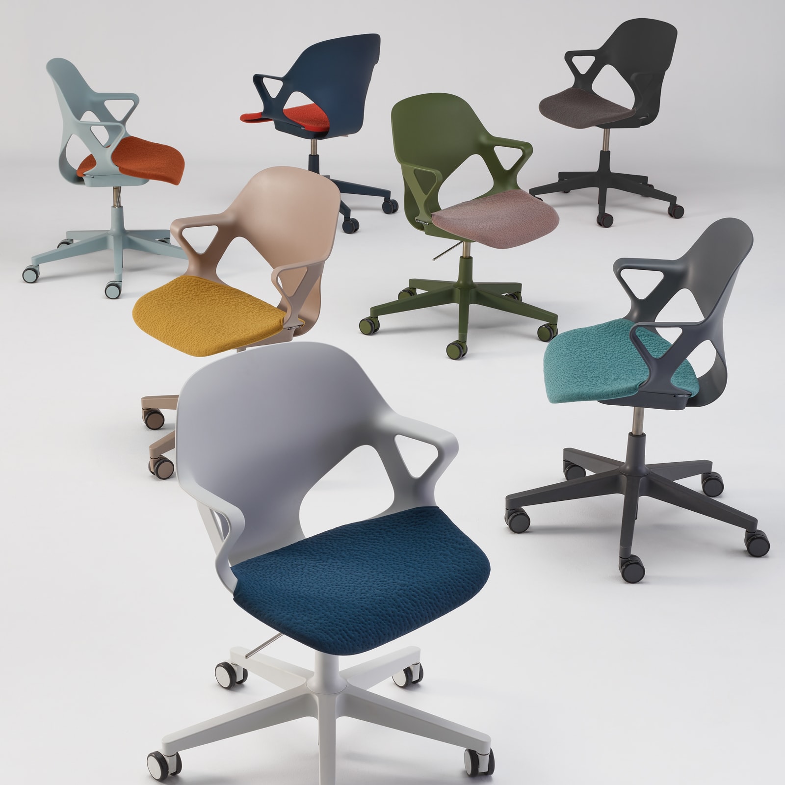 Group photo of five Zeph chairs in varying colors and textiles Group photo of five Zeph chairs in varying colors and textiles