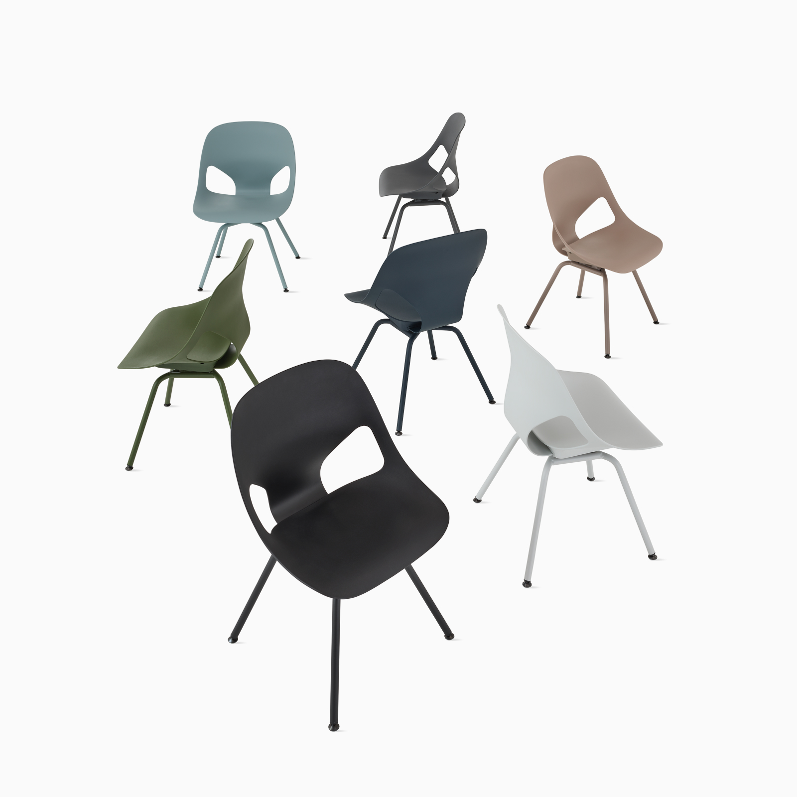 A group of seven Zeph Side Chairs without arms in all available colors . A group of seven Zeph Side Chairs without arms in all available colors .