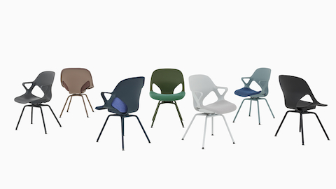 A group of seven Zeph Side Chairs in all available colors . Some chairs have knit seat pads and unibody's. A group of seven Zeph Side Chairs in all available colors . Some chairs have knit seat pads and unibody's.