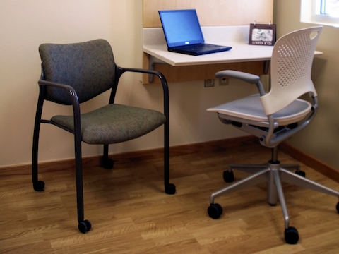A corner desk space with Caper and Aside chairs. A corner desk space with Caper and Aside chairs.