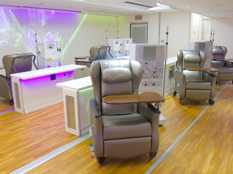 A row of Nemschoff Serenity Chairs sit amidst dialysis machines. A row of Nemschoff Serenity Chairs sit amidst dialysis machines.