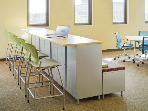 A classroom setting featuring both elevated and conventional seating options. A classroom setting featuring both elevated and conventional seating options.