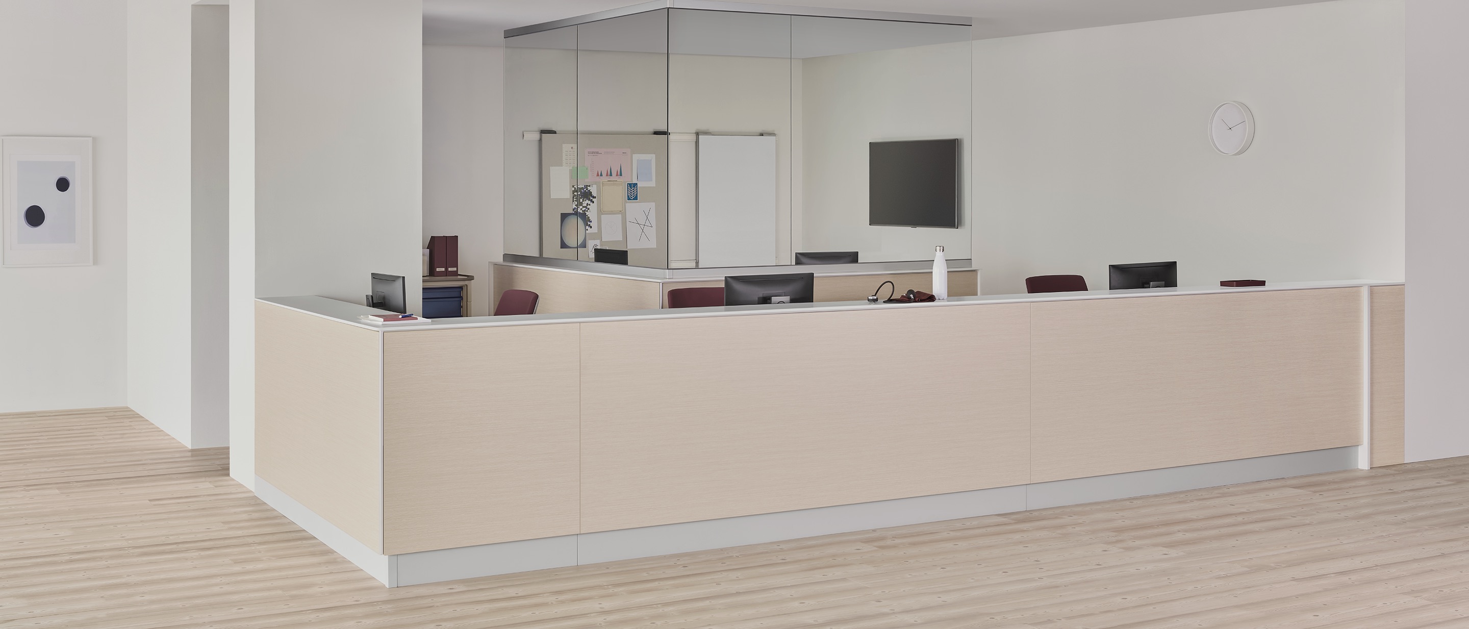 A caregiver environment with a Commend Nurses Station boundary wall and interior team zone defined by surface-to-ceiling glass. A caregiver environment with a Commend Nurses Station boundary wall and interior team zone defined by surface-to-ceiling glass.