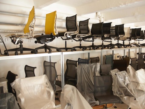 7.5 added a 120 square meter second layer into the preexisting structure, because there was no basement to store things. Now the studio has a visual repository for prototypes, which is essential for the studio's work style. The normal, everyday supplies are stored behind a curtain so as not to create too much distracting clutter. Photo by Marcus Gaab. 7.5 added a 120 square meter second layer into the preexisting structure, because there was no basement to store things. Now the studio has a visual repository for prototypes, which is essential for the studio's work style. The normal, everyday supplies are stored behind a curtain so as not to create too much distracting clutter. Photo by Marcus Gaab.