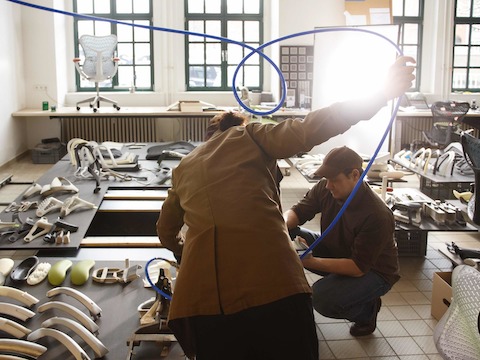An area beside the communal table provides additional workspace—in this instance to assemble components that illustrate how the development of Mirra 2 evolved. Photo by Marcus Gaab. An area beside the communal table provides additional workspace—in this instance to assemble components that illustrate how the development of Mirra 2 evolved. Photo by Marcus Gaab.