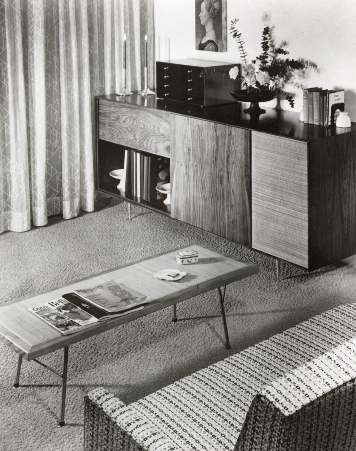 A speaker cabinet from the Nelson Basic Cabinet Series sits in a living room featuring a Nelson Cane Bench being utilized as a coffee table at center positioned in front of a partially visible sofa. A speaker cabinet from the Nelson Basic Cabinet Series sits in a living room featuring a Nelson Cane Bench being utilized as a coffee table at center positioned in front of a partially visible sofa.