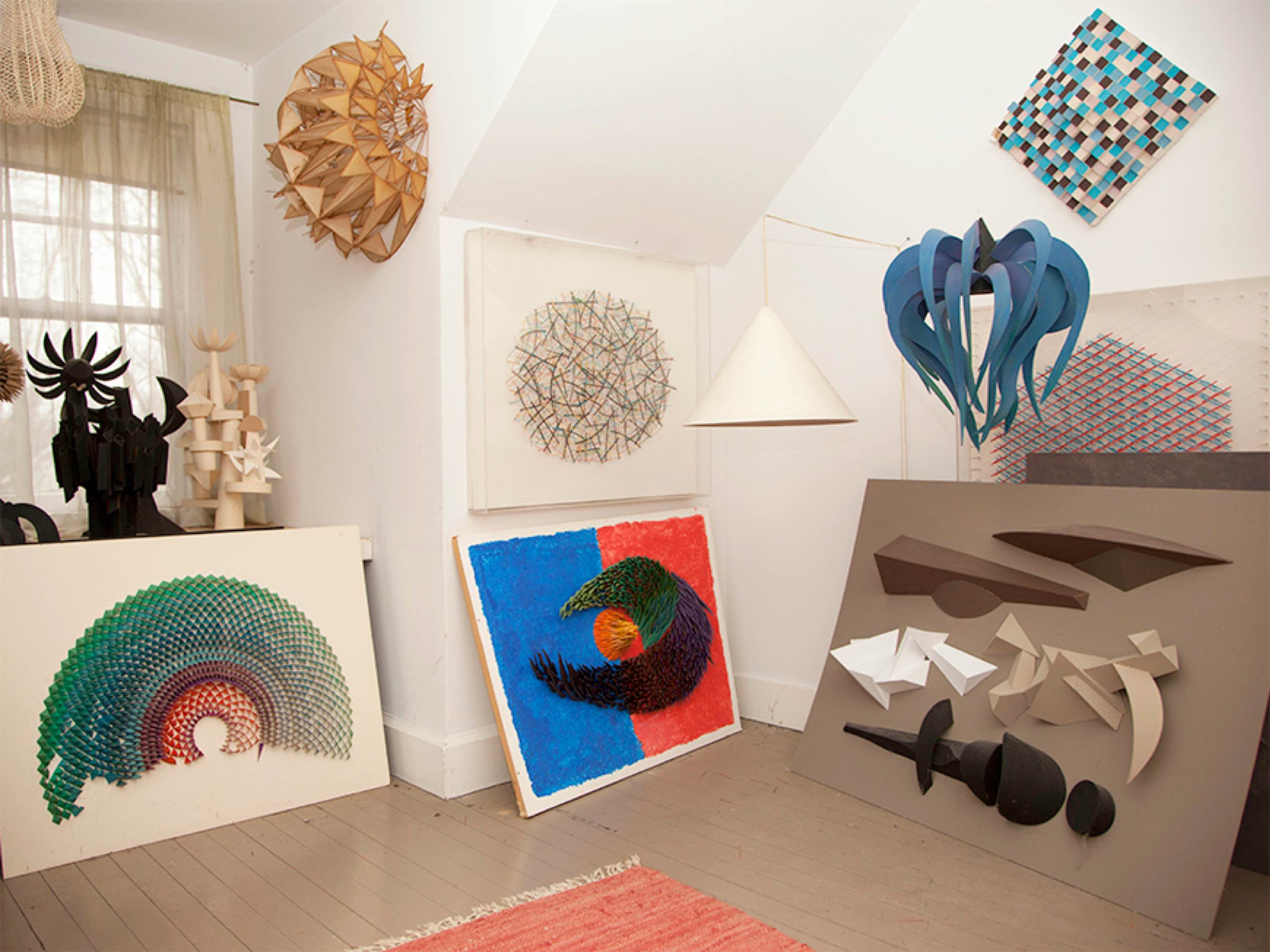 Various pieces of artwork on display in designer Irving Harper's home. Various pieces of artwork on display in designer Irving Harper's home.
