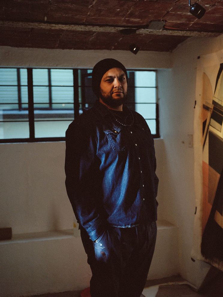 Augustine Kofie at work in his temporary studio space in Mexico City. Photo by Jake Stangel. Augustine Kofie at work in his temporary studio space in Mexico City. Photo by Jake Stangel.
